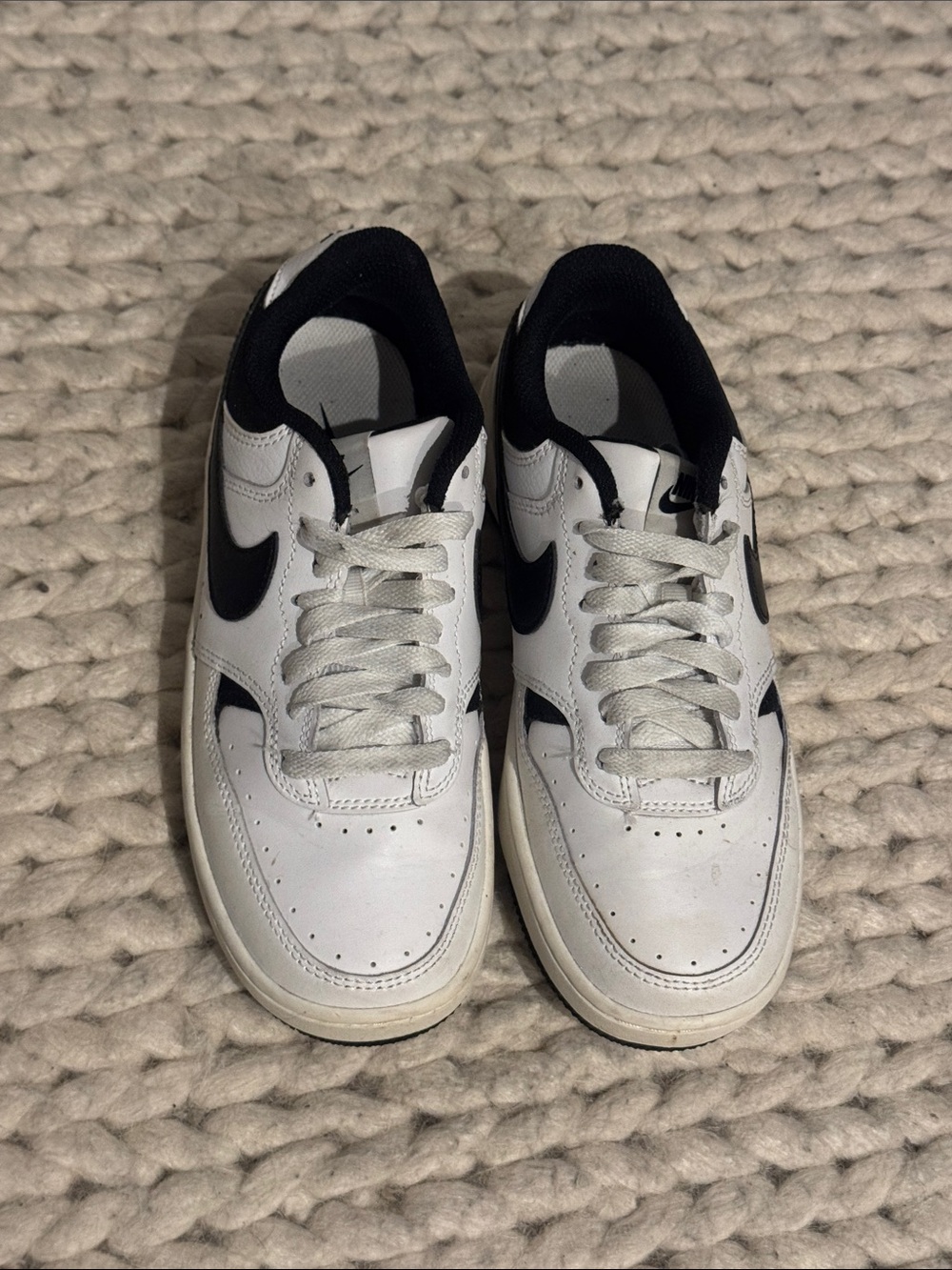 Nike Women’s White and Black Low-Top Sneakers with Black Swoosh